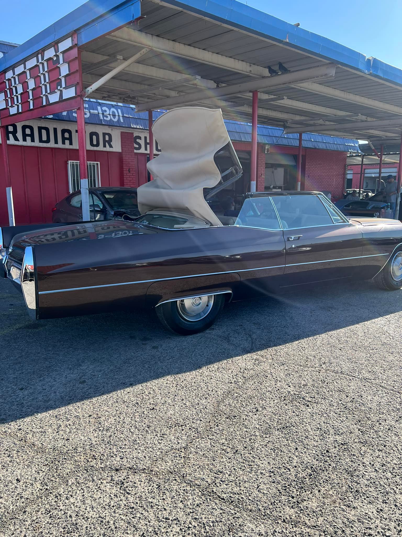 Convertible classic Cadillac with custom paint and upholstery