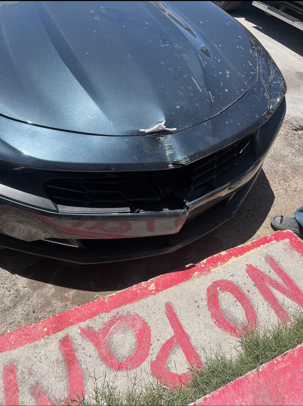 Vehicle before body work, dent repair, and paint reconditioning