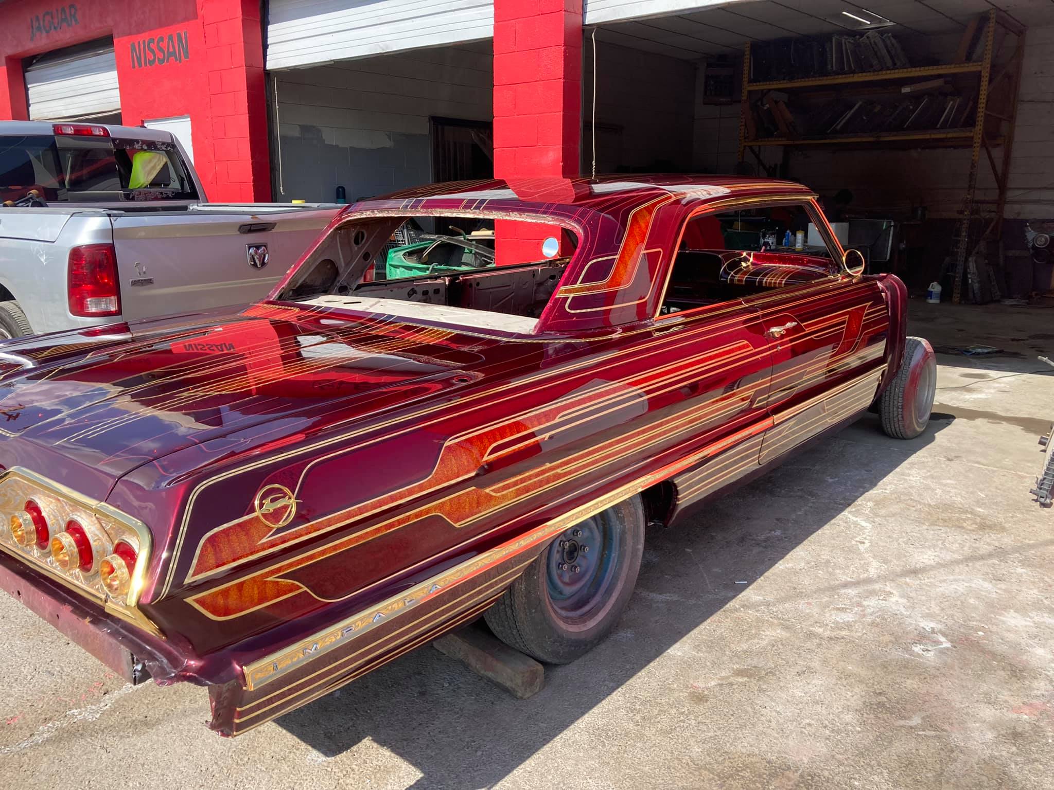 Impala full restoration with candy paint and design patterns